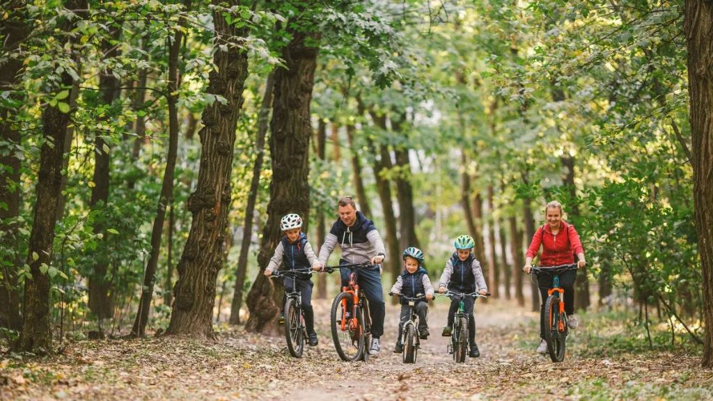Family cycling through Dalby Forest